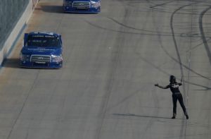 Jennfier Jo Cobb walks onto the track towards eventual winner Tyler Reddick after an early race incident saw her No.10 end up wrecked.